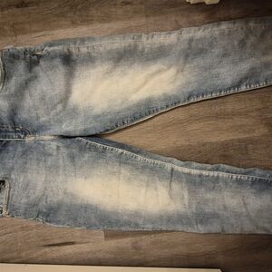 Blue High Rise Jeans with Distressed Wash